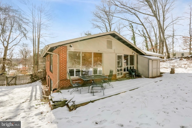 view of snow covered property