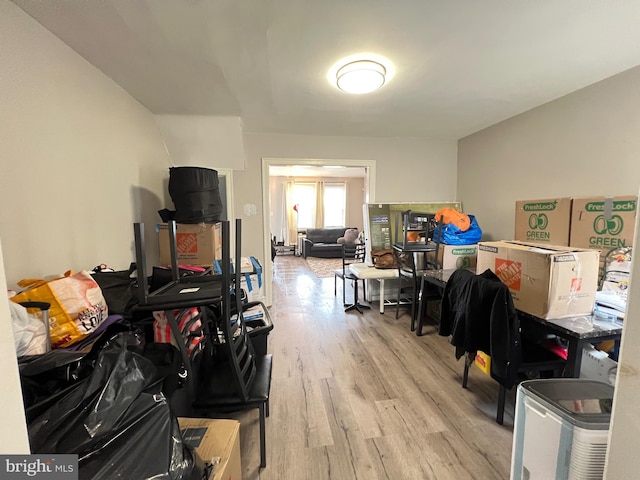 miscellaneous room with light wood-type flooring