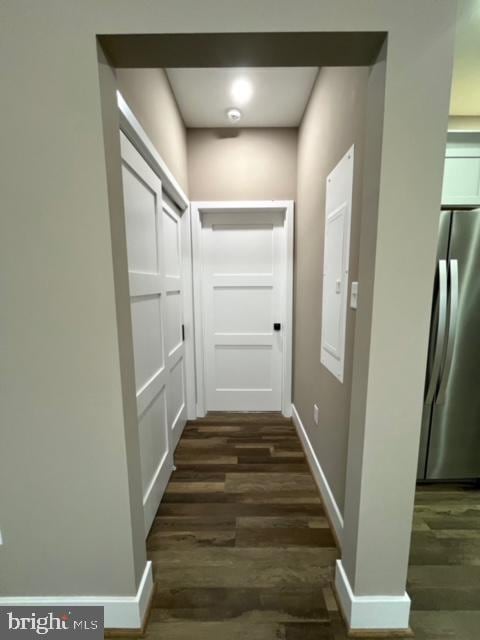 hall featuring dark wood-type flooring