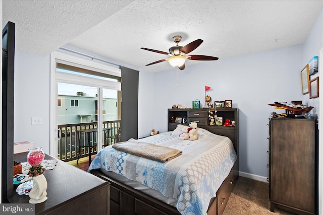 bedroom with carpet flooring, ceiling fan, access to exterior, and a textured ceiling