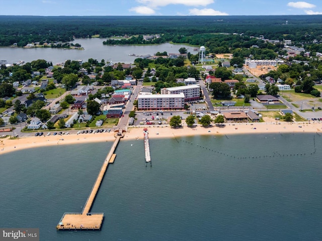 bird's eye view featuring a water view and a view of the beach