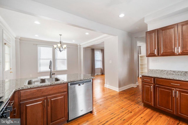 kitchen featuring sink, decorative light fixtures, a notable chandelier, dishwasher, and light hardwood / wood-style floors