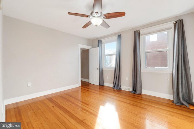 unfurnished bedroom featuring ceiling fan and wood-type flooring