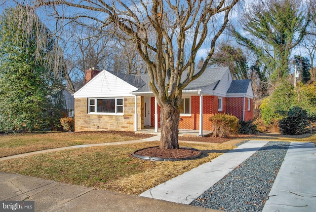 view of front of home with a front yard