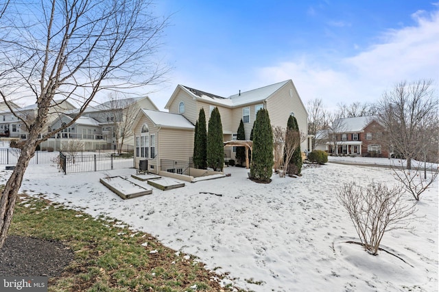 view of snow covered property