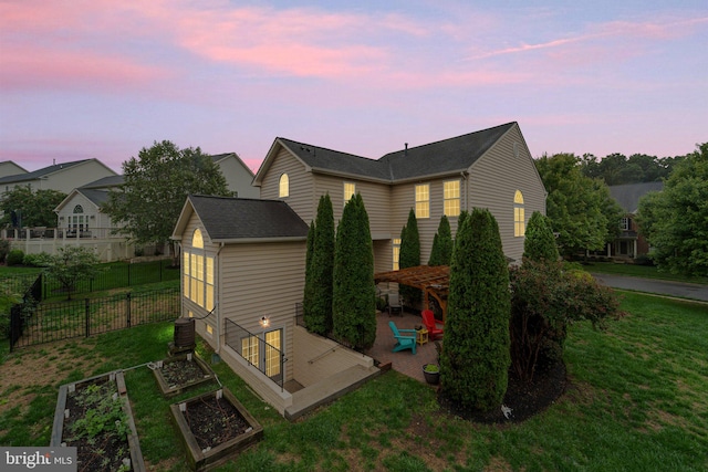 exterior space with a lawn, central AC unit, and a patio area