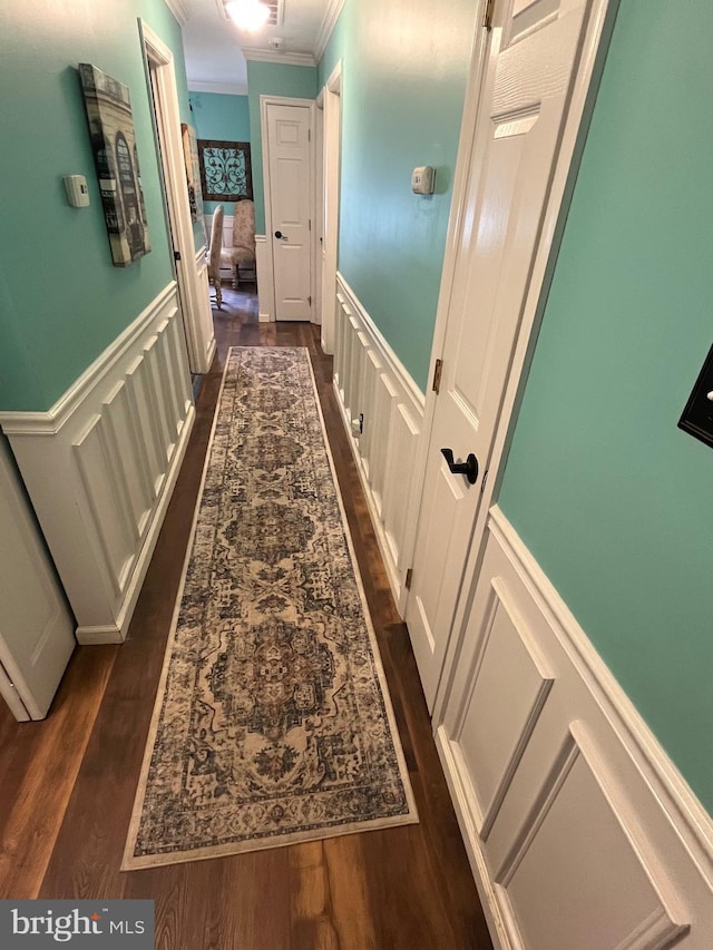 694 5th St, Atco, NJ 08004 - corridor featuring ornamental molding, wainscoting, dark wood-style flooring, and a decorative wall