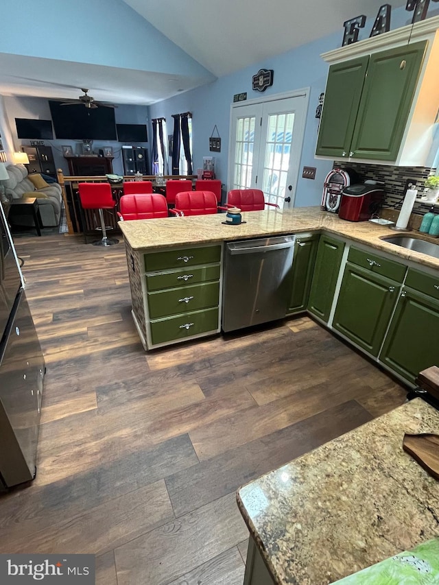 694 5th St, Atco, NJ 08004 - kitchen featuring green cabinetry, stainless steel dishwasher, lofted ceiling, and a sink