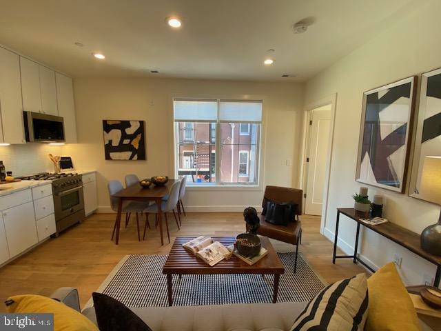 living room featuring light hardwood / wood-style floors