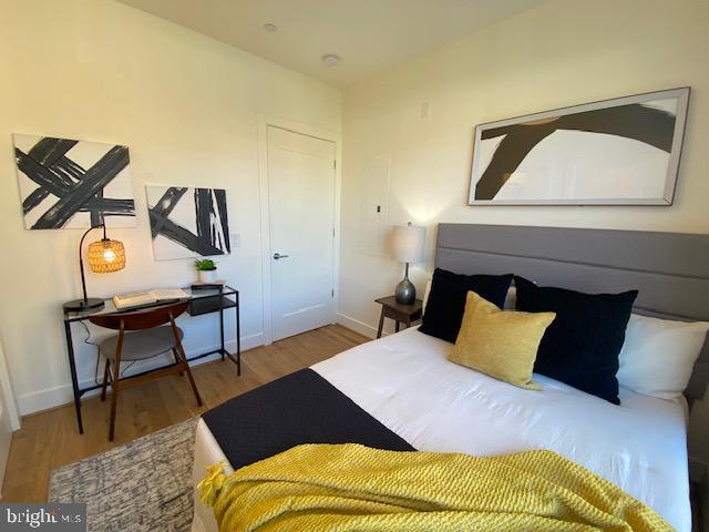 bedroom featuring hardwood / wood-style flooring