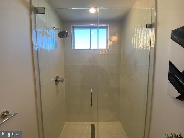 bathroom featuring walk in shower