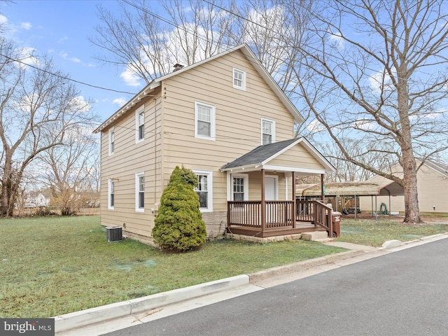 view of front of house featuring central AC unit, a porch, and a front lawn