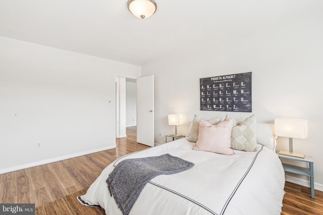 bedroom featuring hardwood / wood-style floors