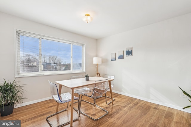 dining room featuring light hardwood / wood-style flooring