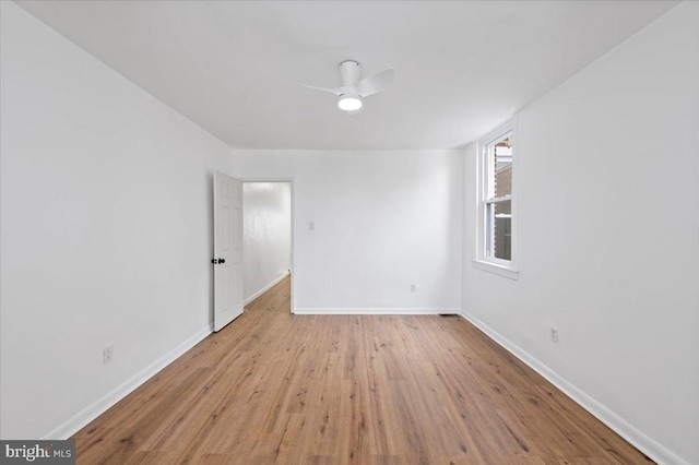 empty room featuring light hardwood / wood-style floors and ceiling fan