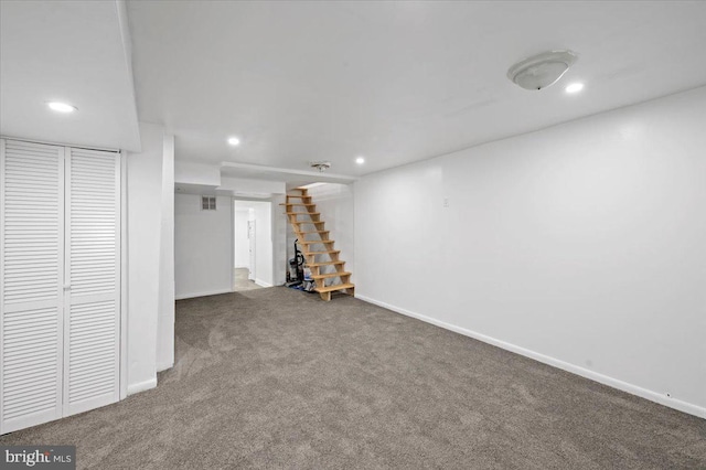 basement featuring carpet flooring