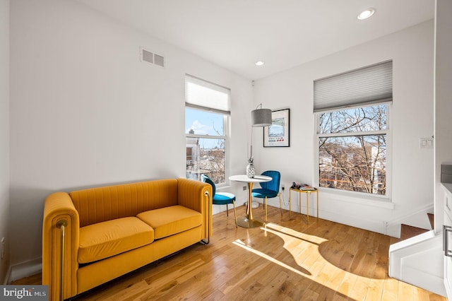 sitting room featuring hardwood / wood-style floors