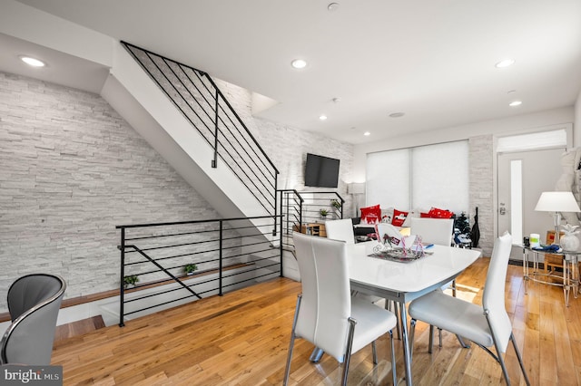 dining space with light wood-type flooring