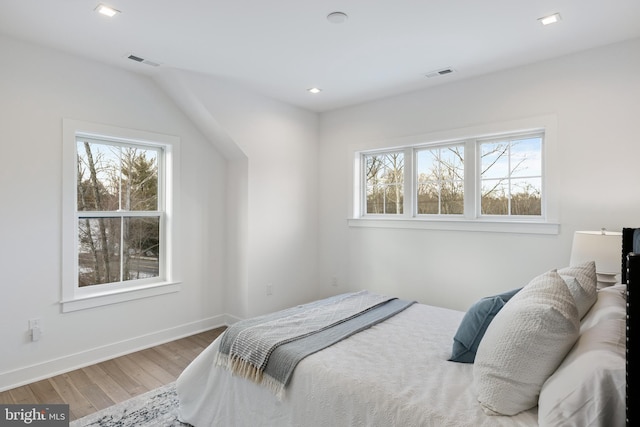 bedroom featuring hardwood / wood-style floors