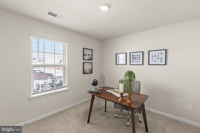 office space featuring light colored carpet