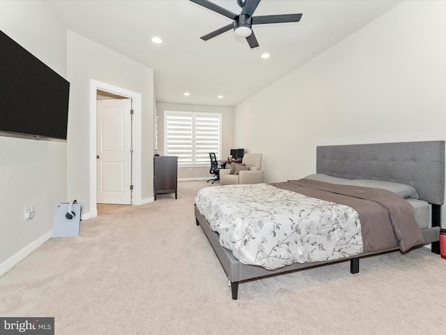 bedroom featuring ceiling fan and light colored carpet