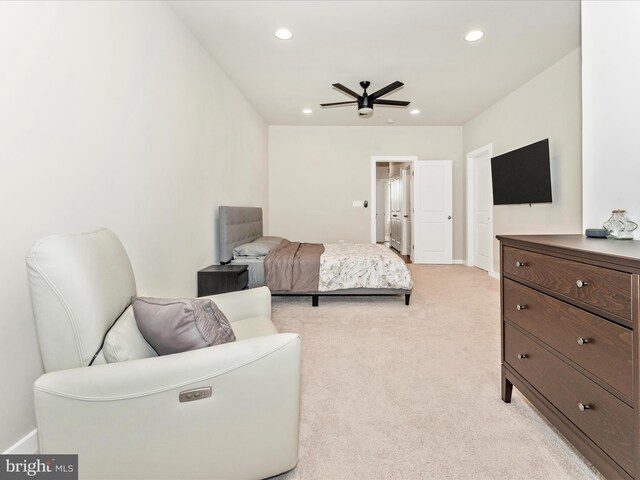 carpeted bedroom featuring ceiling fan