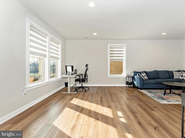 home office with light wood-type flooring