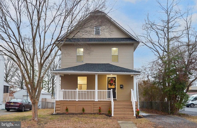 view of property with covered porch