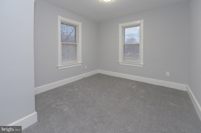 empty room featuring carpet floors