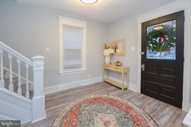 foyer entrance featuring hardwood / wood-style floors