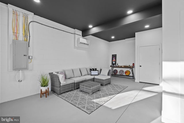 living room with beam ceiling, electric panel, and a wall mounted AC