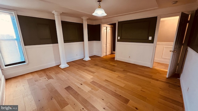 empty room with light hardwood / wood-style flooring