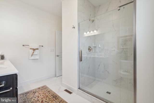 bathroom with vanity and an enclosed shower