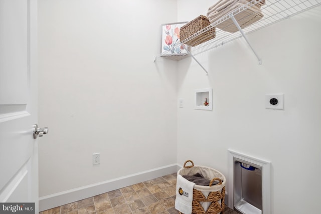 clothes washing area featuring electric dryer hookup and hookup for a washing machine