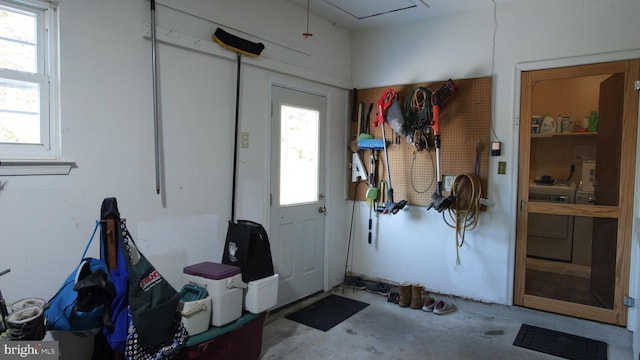 interior space featuring a workshop area, a wealth of natural light, and concrete floors