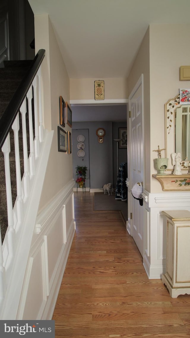 hall with light wood-type flooring