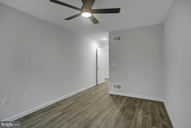 unfurnished room with ceiling fan and hardwood / wood-style floors