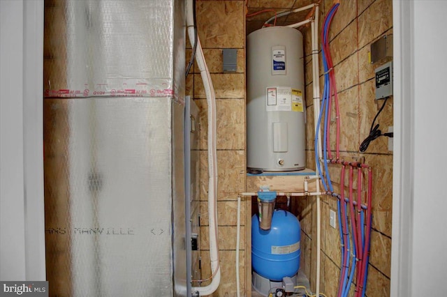 utility room with water heater