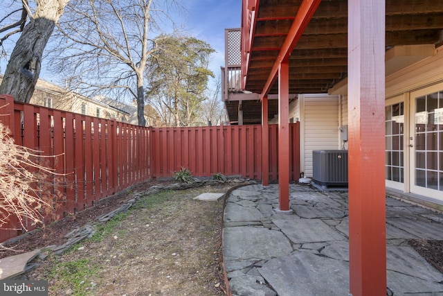 exterior space featuring central AC unit