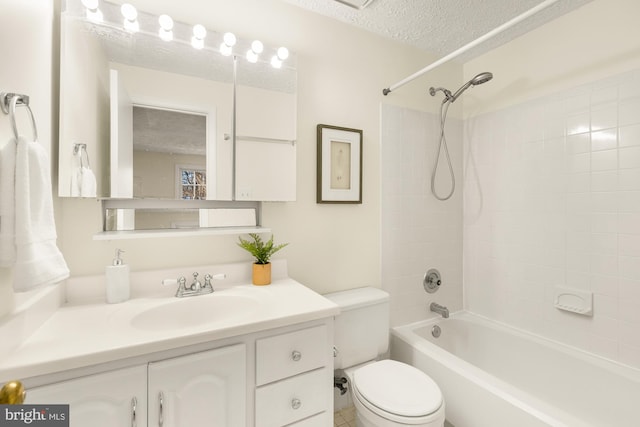 full bathroom with toilet, tiled shower / bath combo, a textured ceiling, and vanity