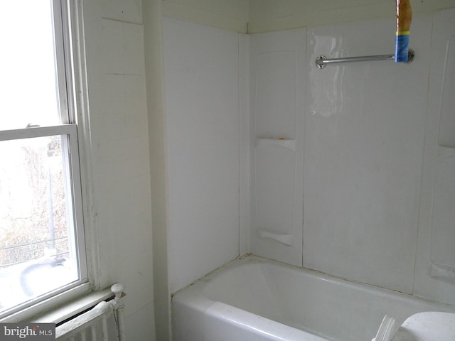 bathroom with radiator heating unit