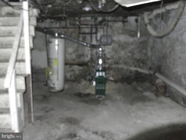 basement featuring water heater