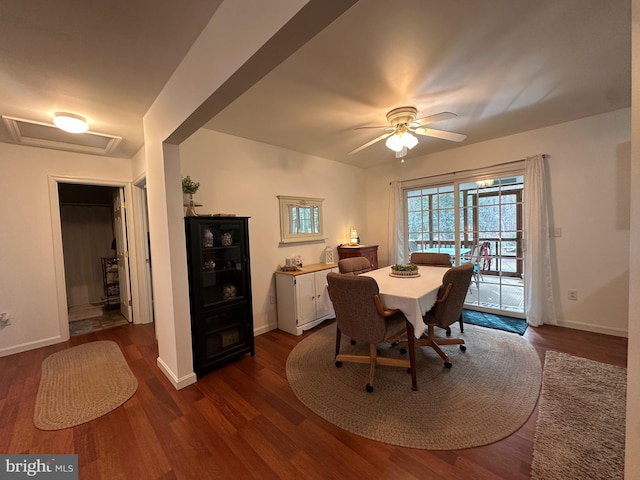 dining area featuring ceiling fan and dark hardwood / wood-style flooring