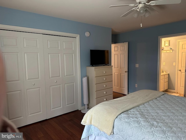 bedroom featuring a closet, ceiling fan, dark wood-type flooring, and ensuite bathroom