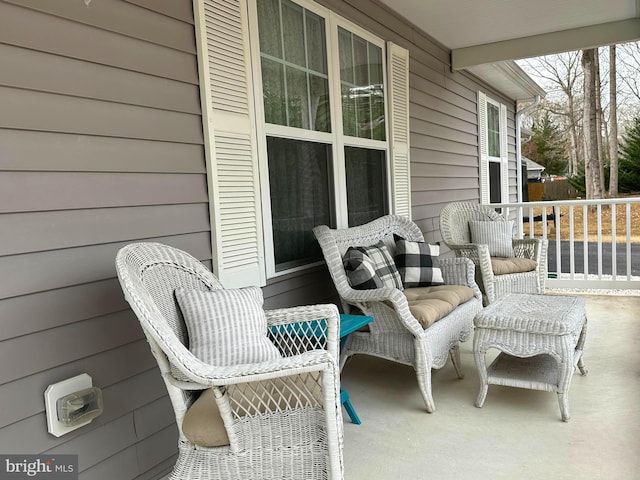 view of patio featuring a porch