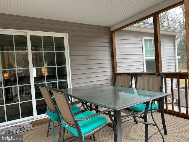 sunroom / solarium featuring a wealth of natural light