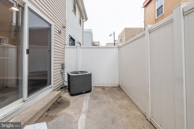 view of patio with central AC