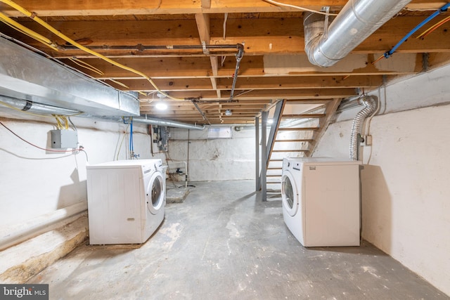 basement featuring washer and clothes dryer