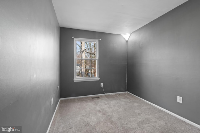 unfurnished room featuring carpet floors