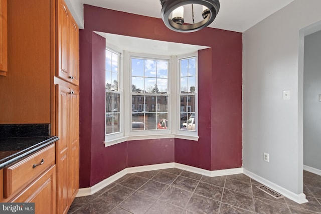 view of unfurnished dining area